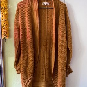 Cropped arm length cardigan